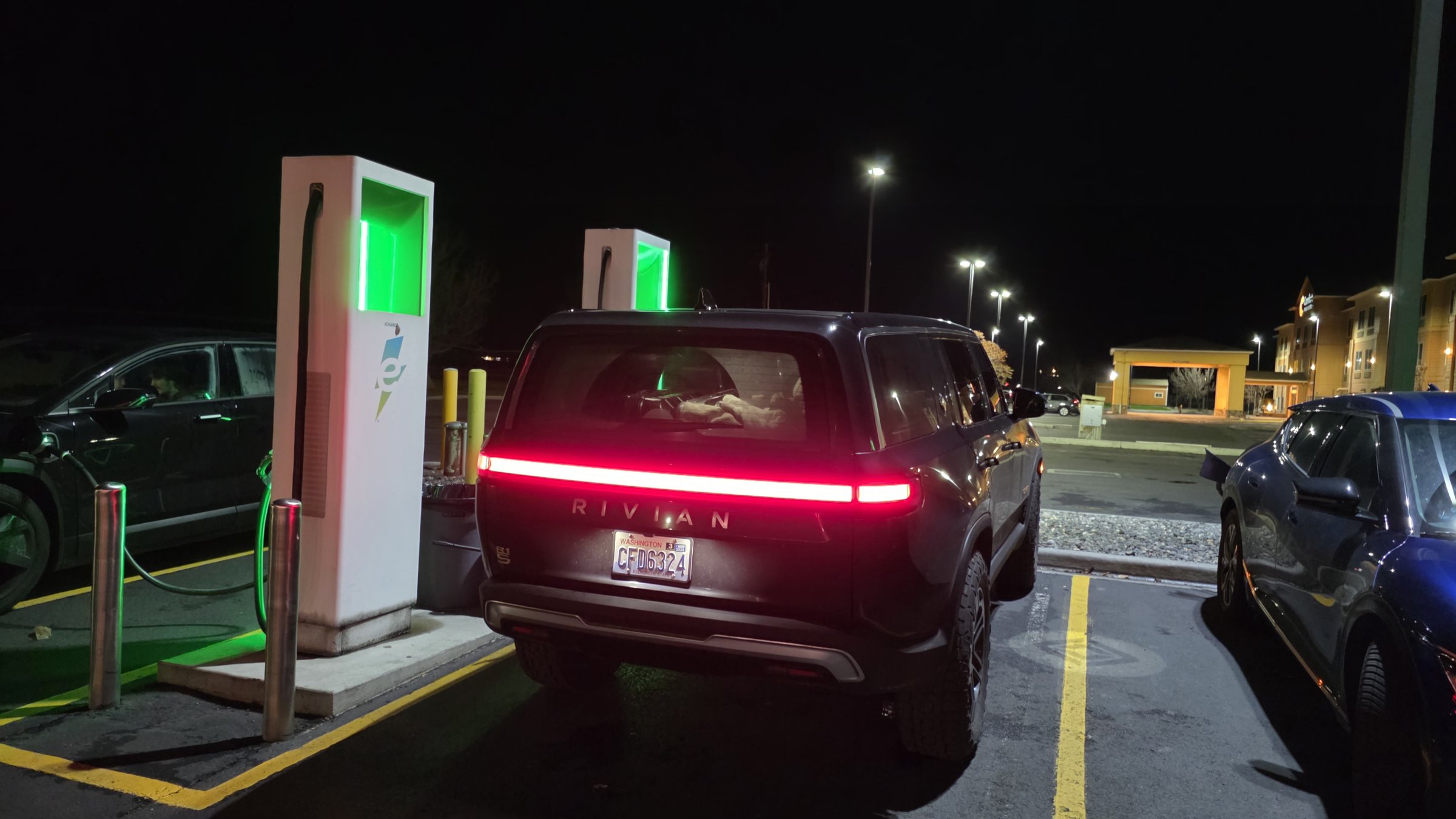 R1S charging at Electrify America in Hermiston, Oregon at night