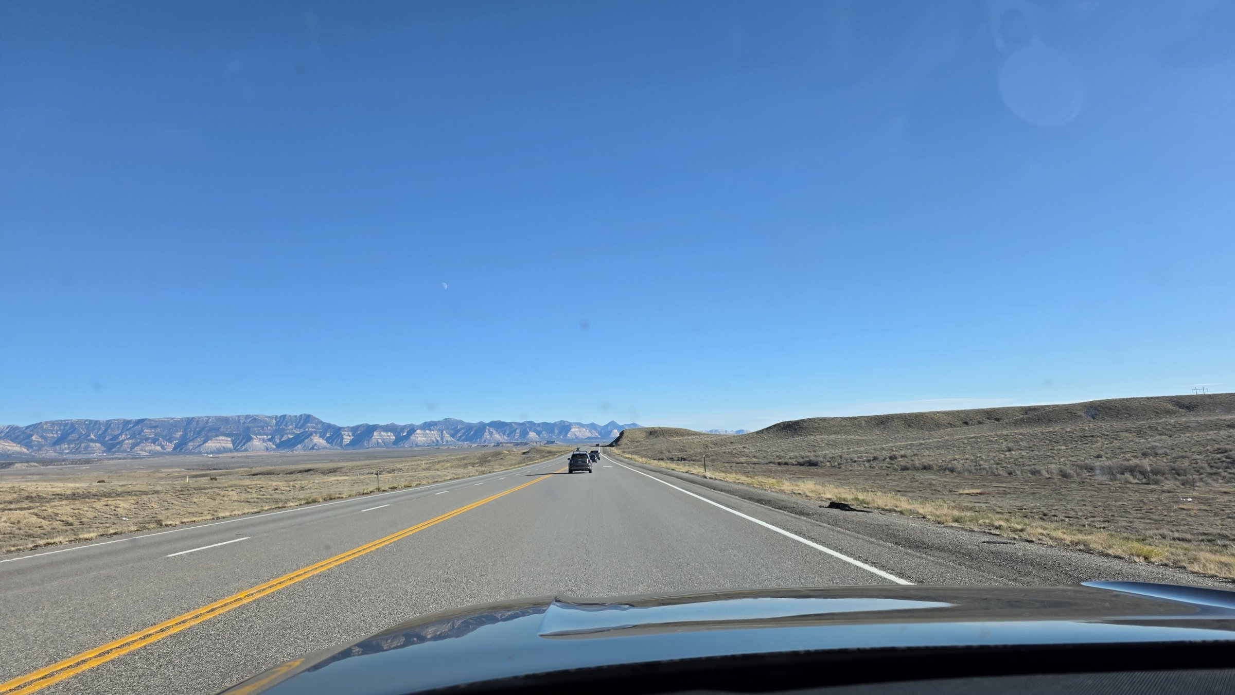 Highway heading south through Utah canyon country toward Moab